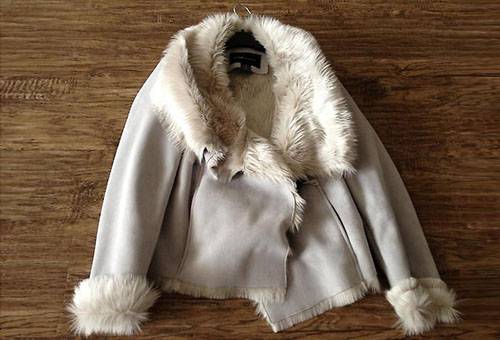 Manteau en fausse peau de mouton