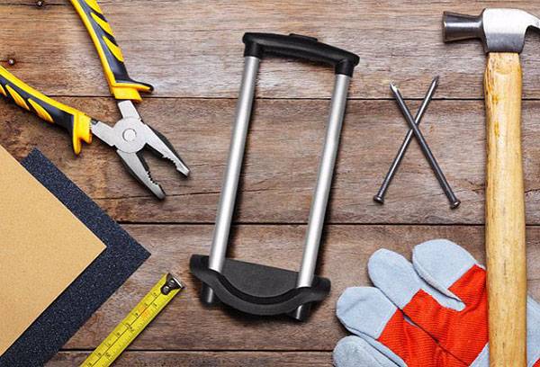 Réparer une valise à poignée rétractable