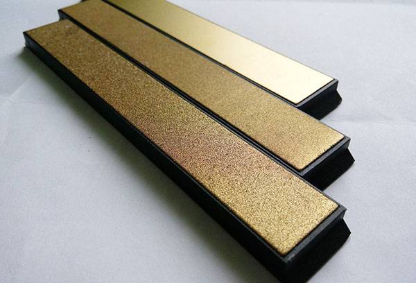 Trois types de grains de pierre à aiguiser