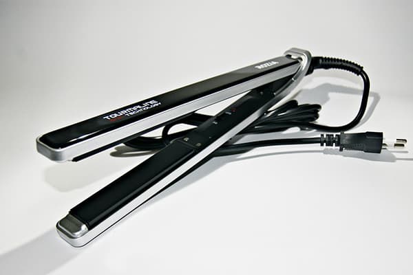 Fer avec revêtement tourmaline