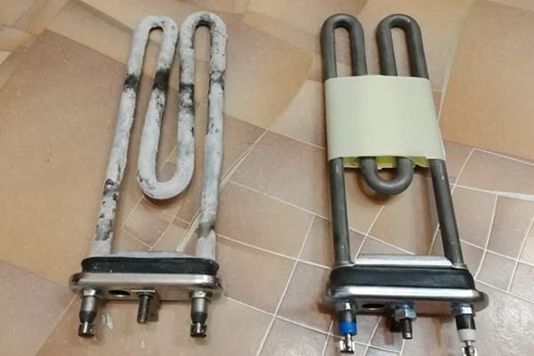 Élément chauffant ancien et nouveau pour une machine à laver