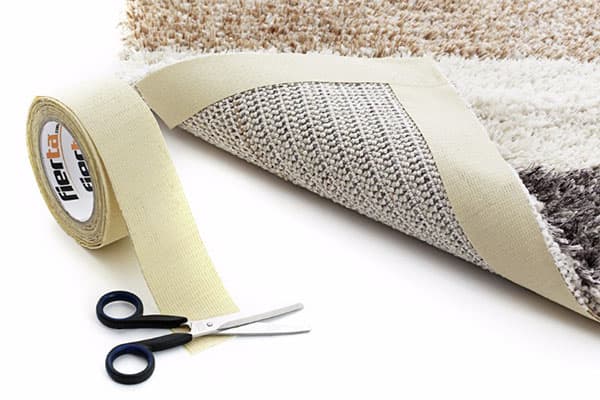 Ruban adhésif pour tapis