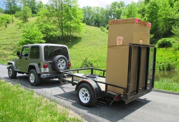 Transporter le réfrigérateur verticalement