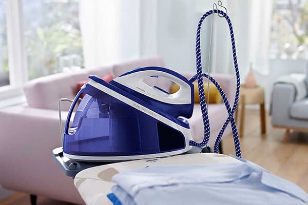 Fer à repasser avec centrale vapeur