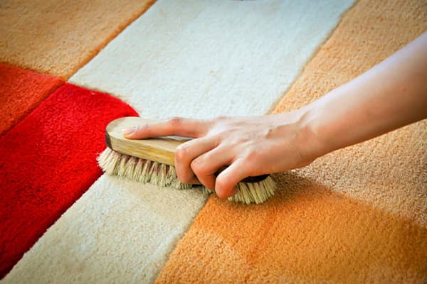 Brosser le tapis