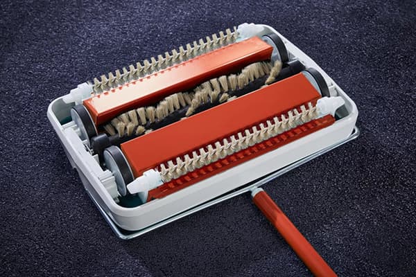 Brosse à tapis mécanique