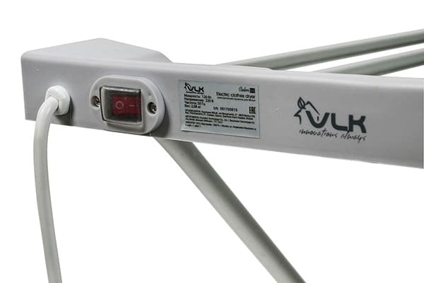 Bouton sur un sèche-linge électrique