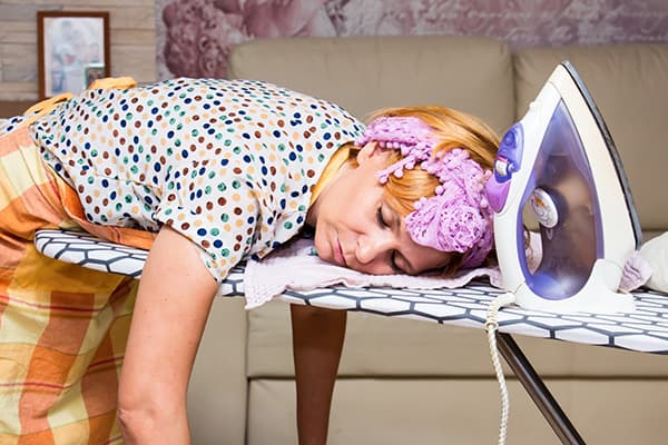 Femme au foyer fatiguée