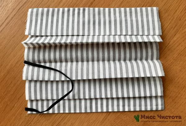 plier le tissu en forme de chevrons