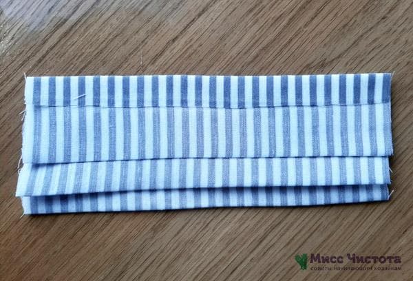 plier le tissu en forme de chevrons