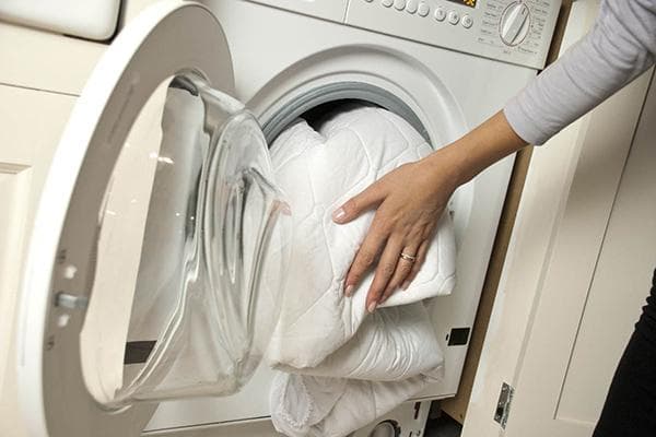 Laver le linge de lit en machine