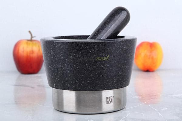 Mortier et pilon en pierre