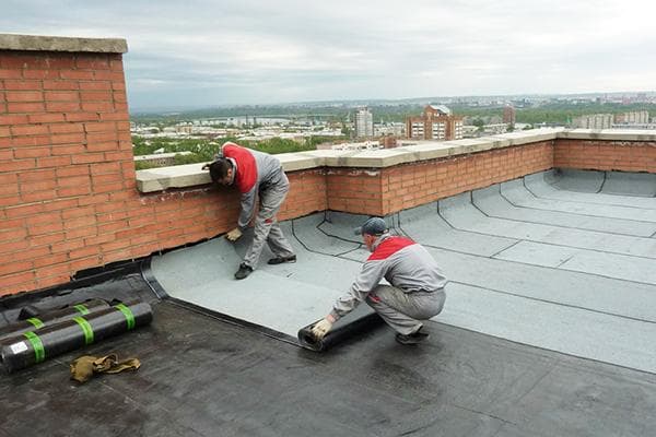 Réfection de la toiture d'un immeuble à appartements