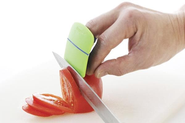 Bouclier pour protéger les doigts lors du déchiquetage