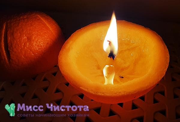 Bougie allumée en zeste d'orange