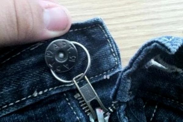 Fixer le curseur sur un jean avec un anneau