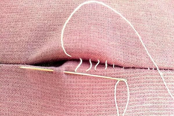 Couture aveugle d'échelle