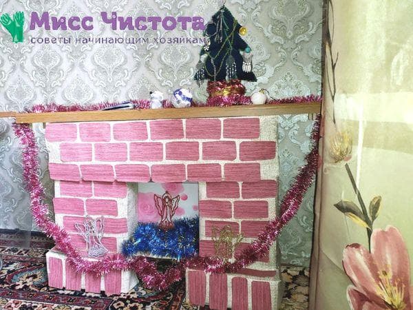 Cheminée réalisée à partir de cartons photo 7