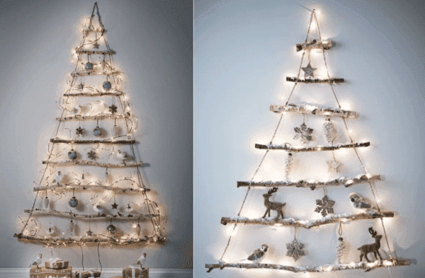 Sapin de Noël composé de guirlandes et de bâtons