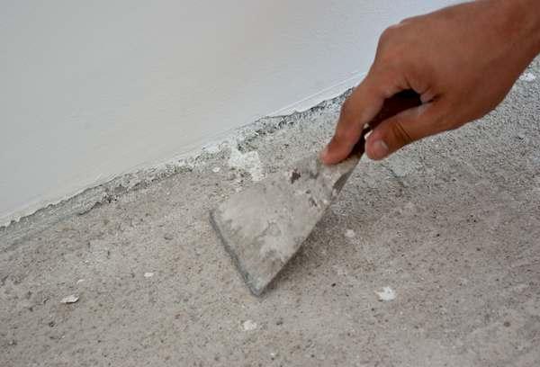 Nettoyer le béton pour coller le linoléum