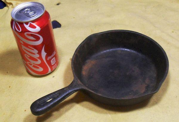 Nettoyer la poêle avec du Coca Cola